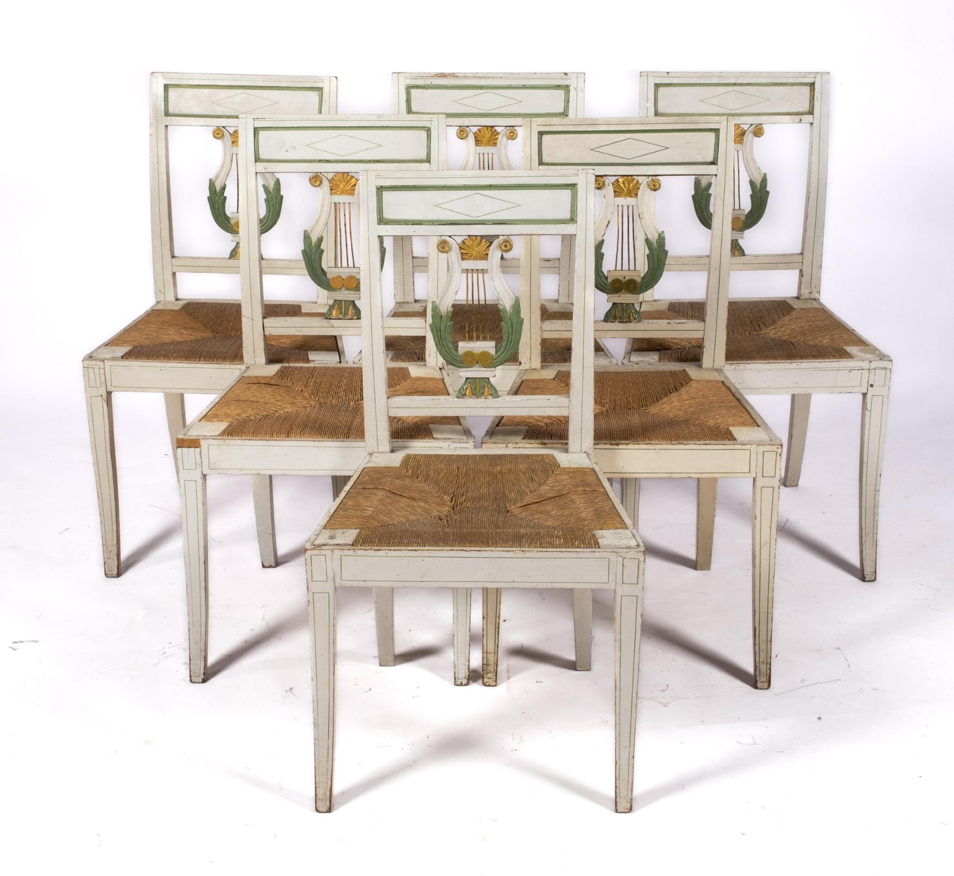 A set of six Empire polychrome-painted dining chairs