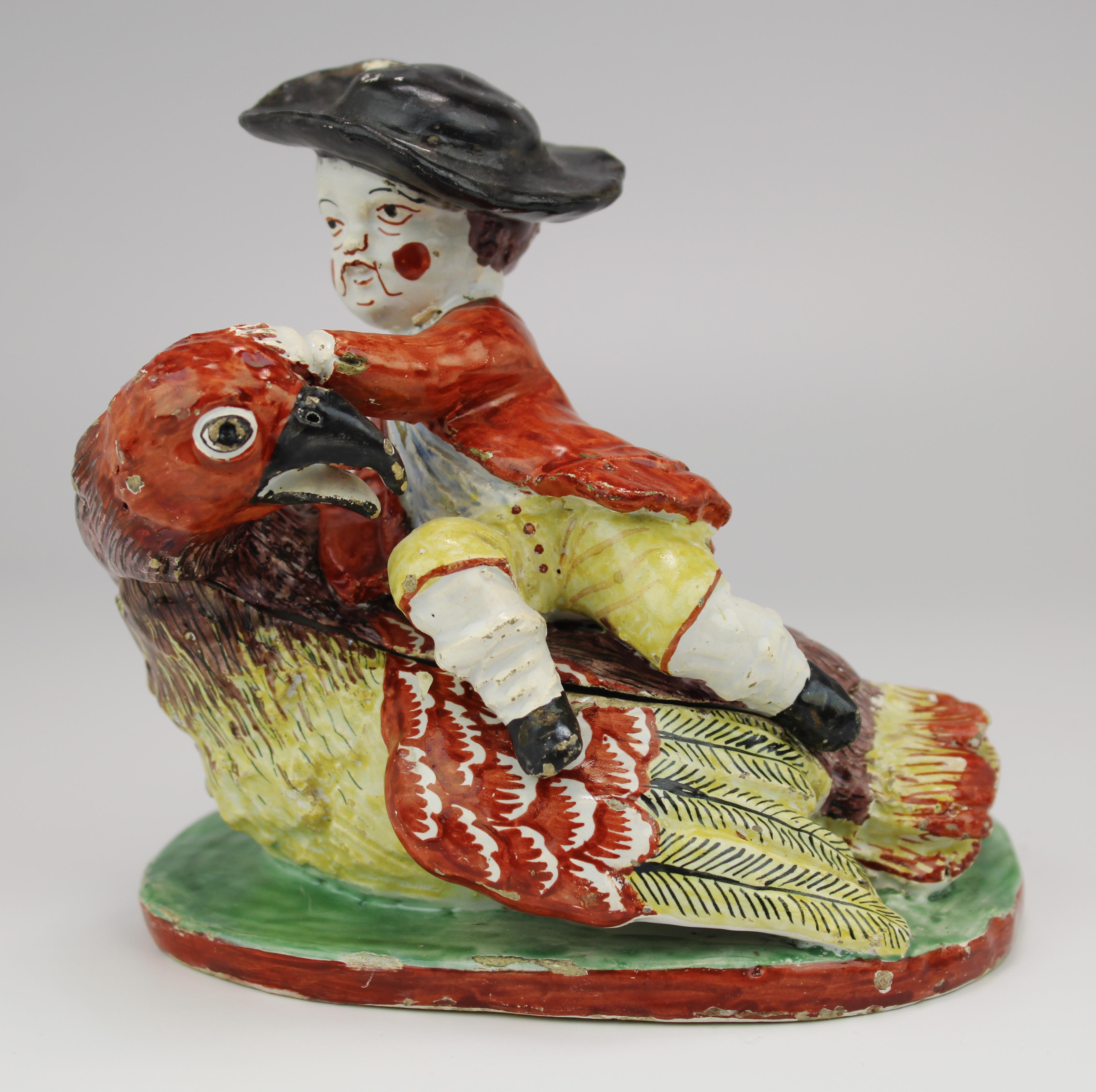 A Dutch Delft polychrome dish as a boy on a bird - Image 3 of 6