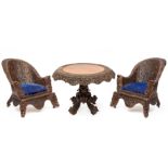 A suite of Anglo-Indian carved hardwood furniture