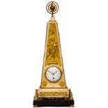 A Louis XVI ormolu and white and black marble obelisk mantle clock