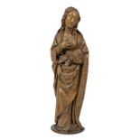 A Lower Rhine carved oak Annunciation Madonna