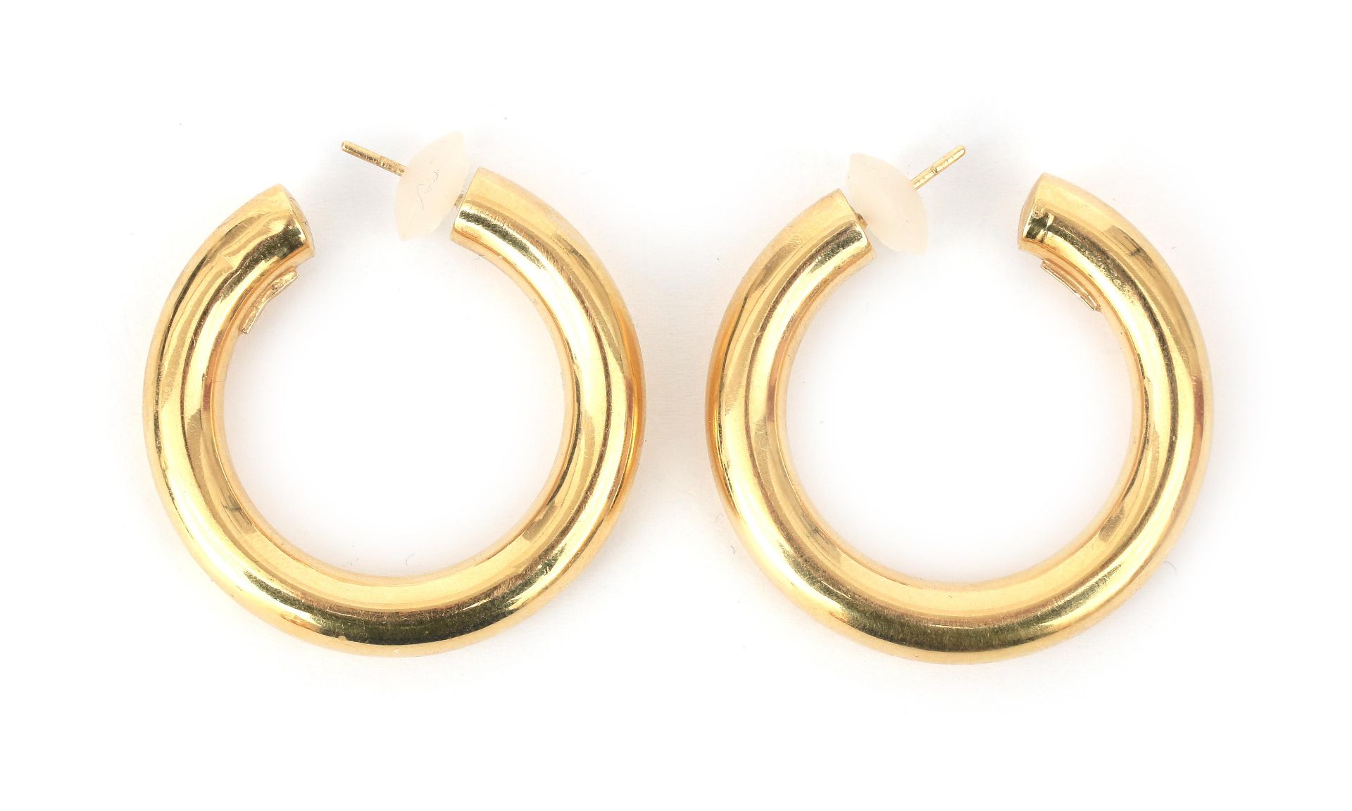 A pair of 18 karat gold ear hoops