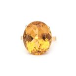 A 14 karat gold citrine ring