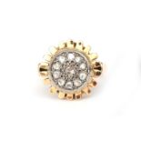 An 18 karat gold rose cut diamond cluster ring