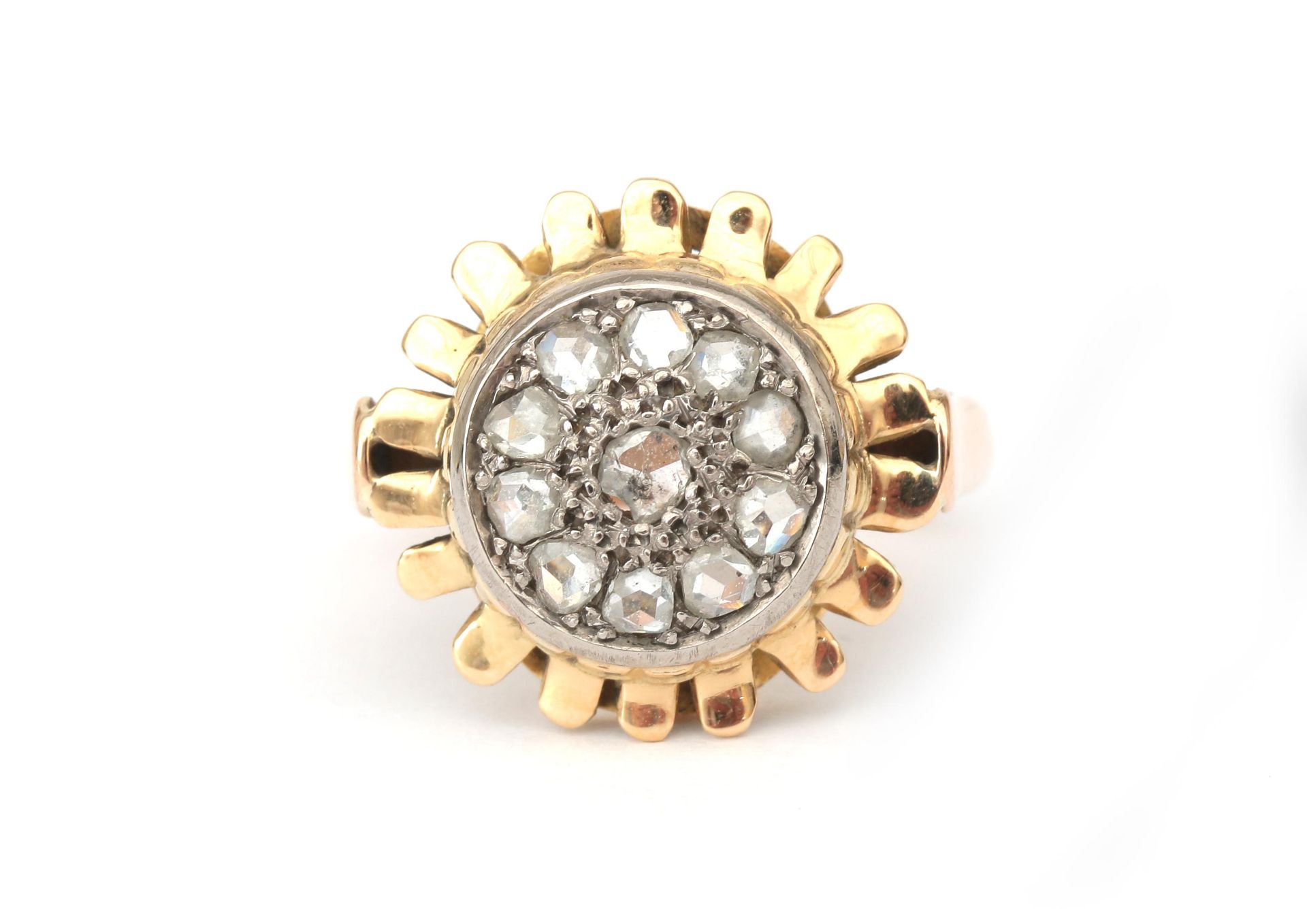 An 18 karat gold rose cut diamond cluster ring