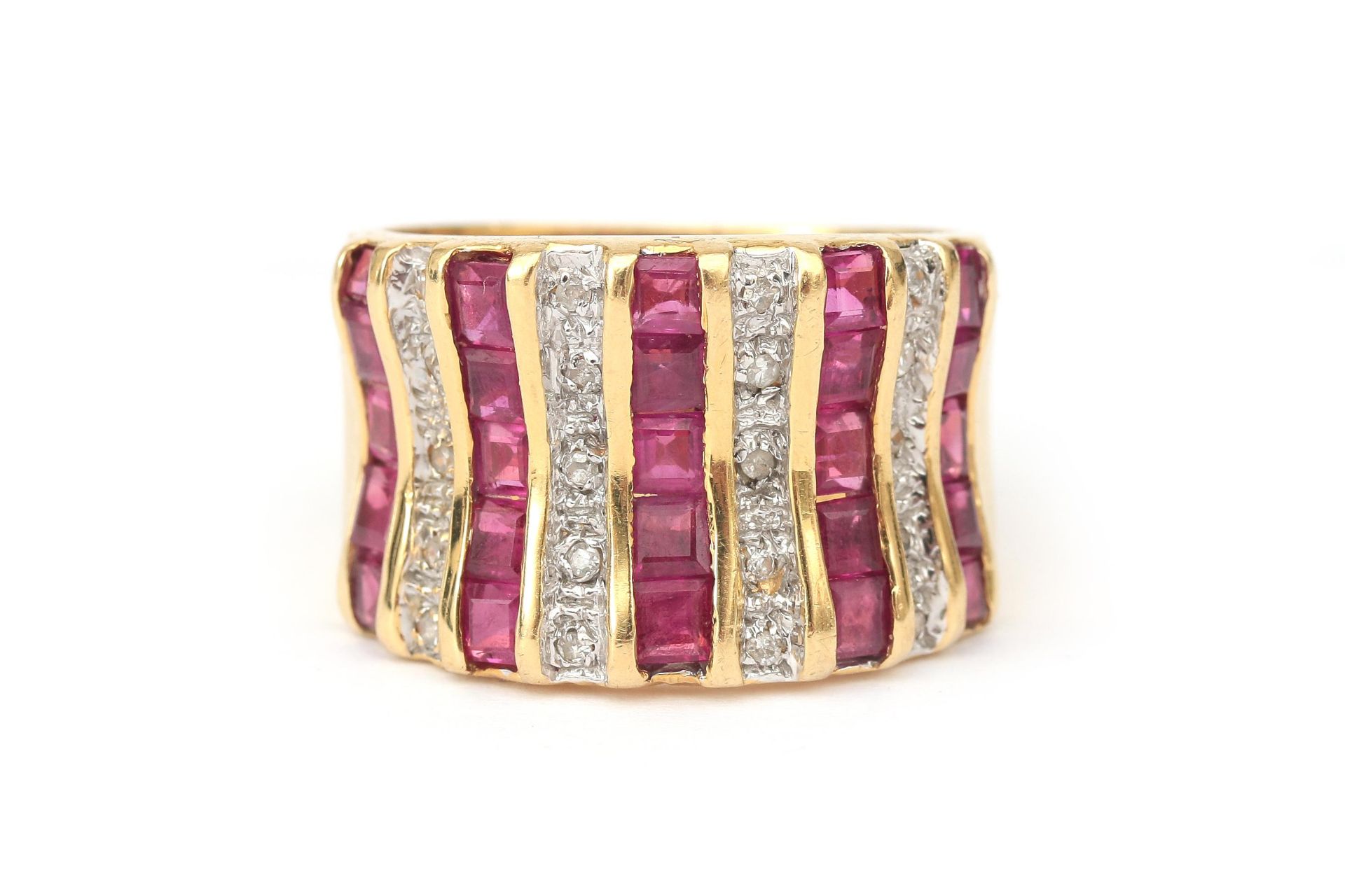 An 18 karat gold ruby and diamond ring 