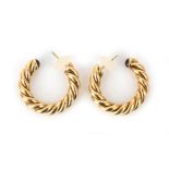 A pair of 18 karat gold twisted hoops with tourmaline