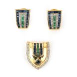 An 18 karat diamond, emerald and sapphire gold set