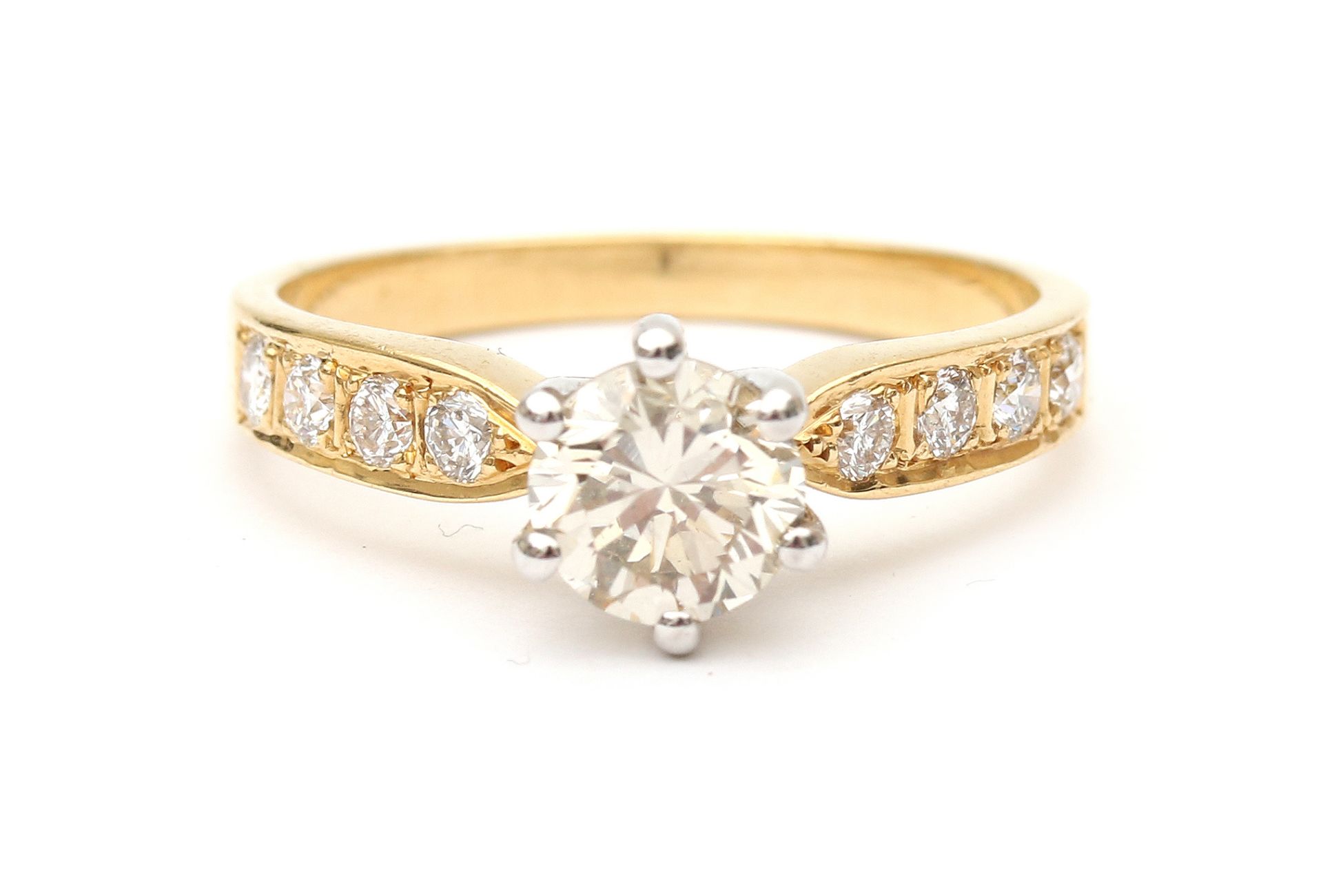 An 18 carat yellow gold diamond solitaire ring 