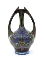 De Distel, Amsterdam A ceramic two-handled vase decorated on both sides with stylised floral