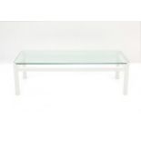 Kho Liang Ie (1927-1975) A rectangular section white lacquered wooden and glass coffee table,