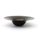 Ben Oldenhof (1955) A stoneware bowl shaped as a cardinal's hat, matt black glazed with bronze-