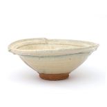 Michel Gardelle (1949) A stoneware bowl decorated with running glaze, the wall distorted, circa