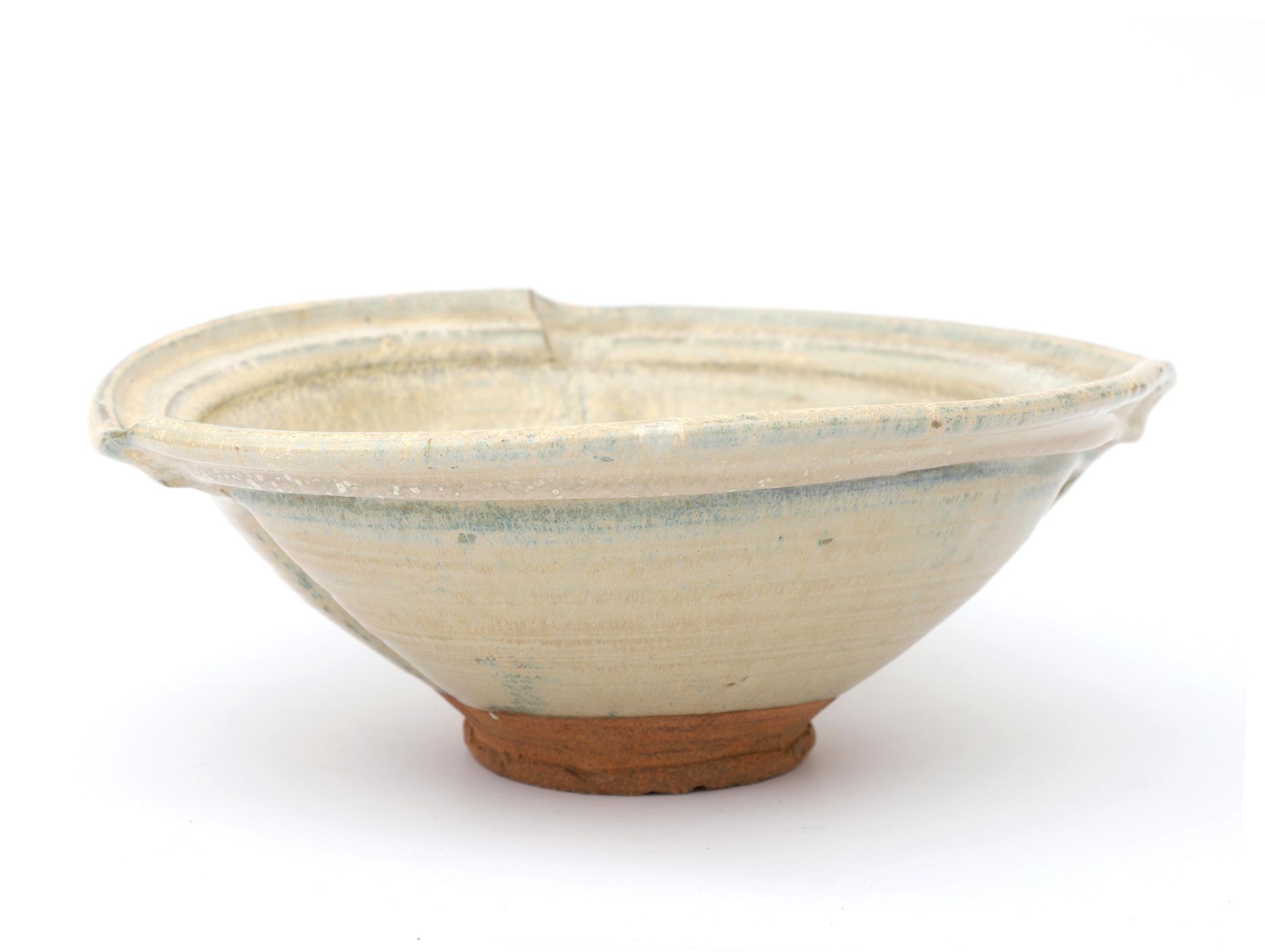 Michel Gardelle (1949) A stoneware bowl decorated with running glaze, the wall distorted, circa