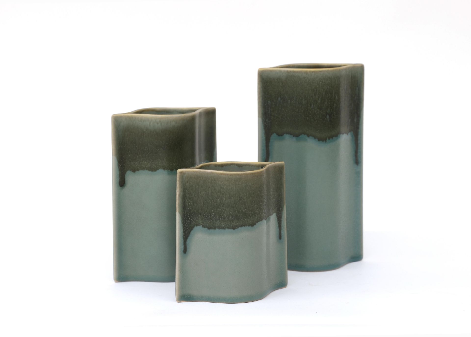 Karl Scheid (1929-2019) Three green and brown glazed porcelain vases, ascending in height,