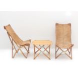 J. Hardy A set of two wooden folding chairs with sling leather seats and a folding table with