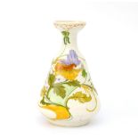 Plateelbakkerij Zuid Holland, Gouda A white glazed ceramic vase with floral pattern, circa 1910,