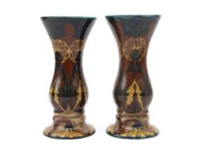De Distel, Amsterdam Two ceramic vases with identical abstract floral pattern on brown and green