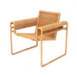 Marcel Breuer (1902-1981) (in the style of) A cane wickered armchair inspired by the Wassily