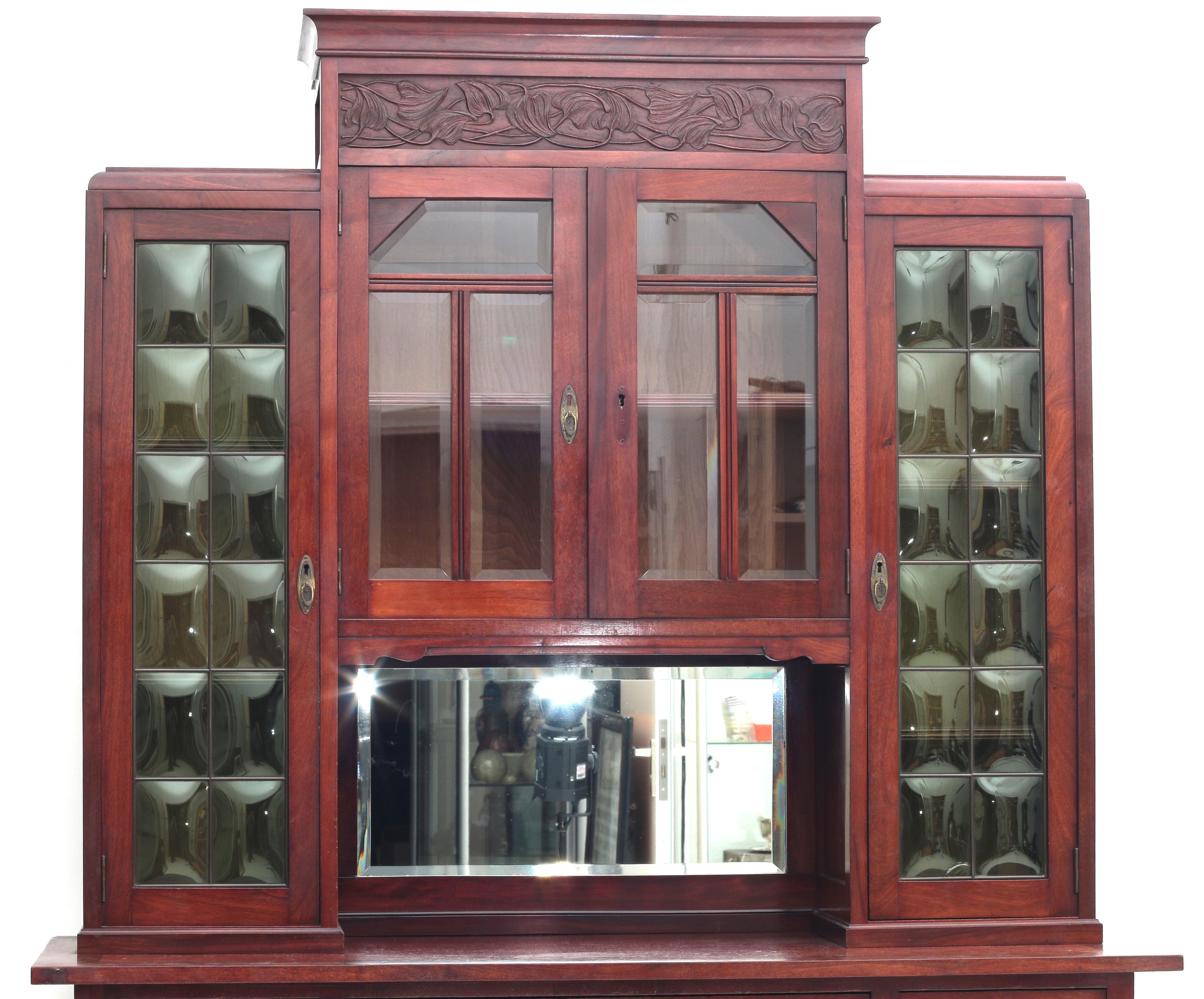 Art Nouveau A mahogany sideboard, the upper part with four glass-paned doors and a mirror, the lower - Image 5 of 6