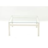 Kho Liang Ie (1927-1975) A square section white lacquered wooden and glass coffee table, model