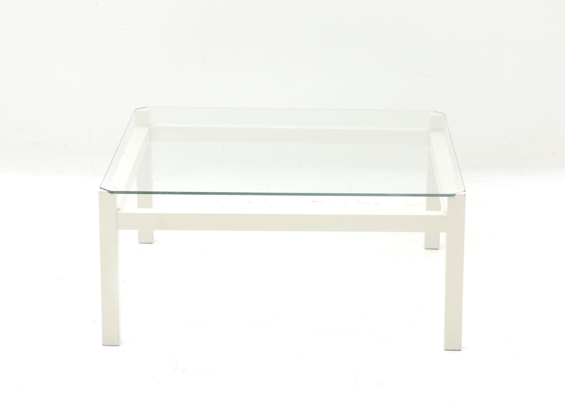 Kho Liang Ie (1927-1975) A square section white lacquered wooden and glass coffee table, model