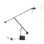 Fase, Madrid An adjustable black lacquered metal and plastic counter balance halogen desk lamp,