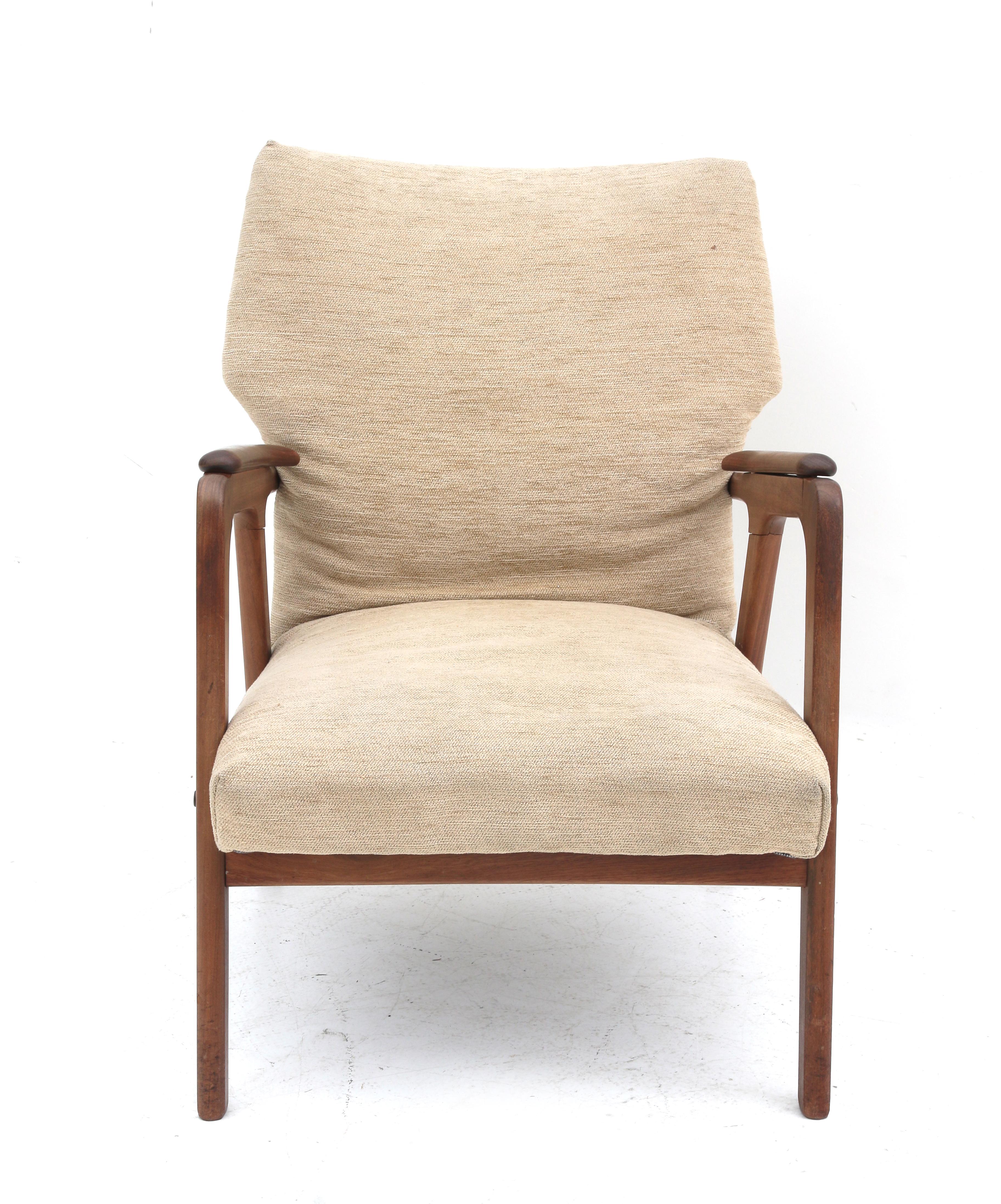 Midcentury Modern A teak easy chair, the seat and backrest with cream fabric upholstery, in the - Image 2 of 3