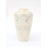Fa. Jb Vet & Co, Purmerend A matt white glazed ceramic vase decorated with repeating floral