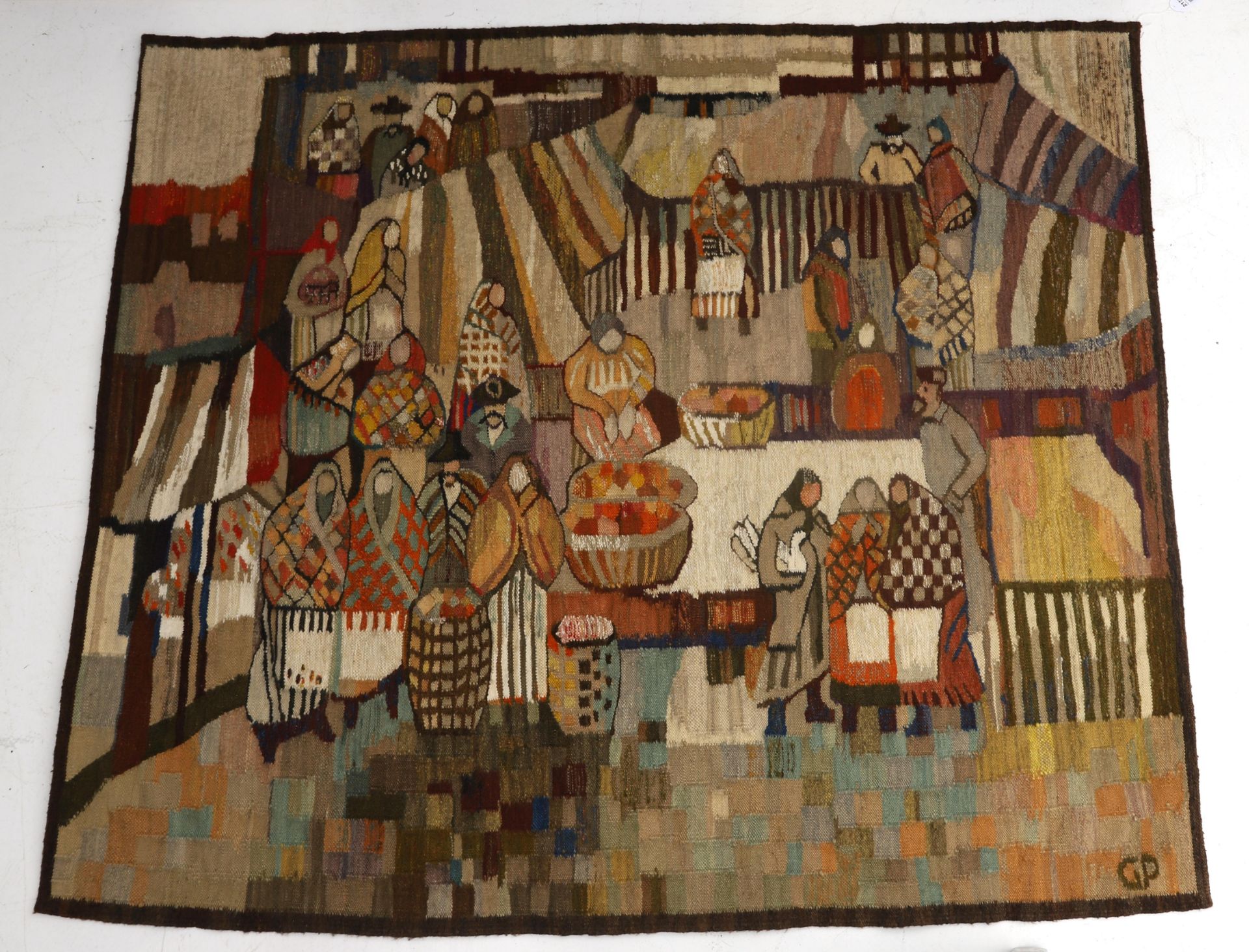 Piotr Grabowski (1933) A handwoven wall tapestry decorated with a market scene, 1972, signed with