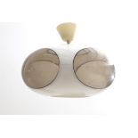 Massive (B) A white plastic ufo-shaped hanging lamp with oval smoke-coloured parts, designed