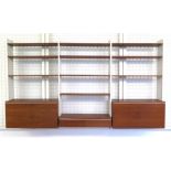 Midcentury Modern A white lacquered wood and teak modular wall system comprising bookshelves,