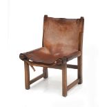 Paco Muñoz (1929-2009) A lacquered wooden child's chair with brown saddle leather seat, with