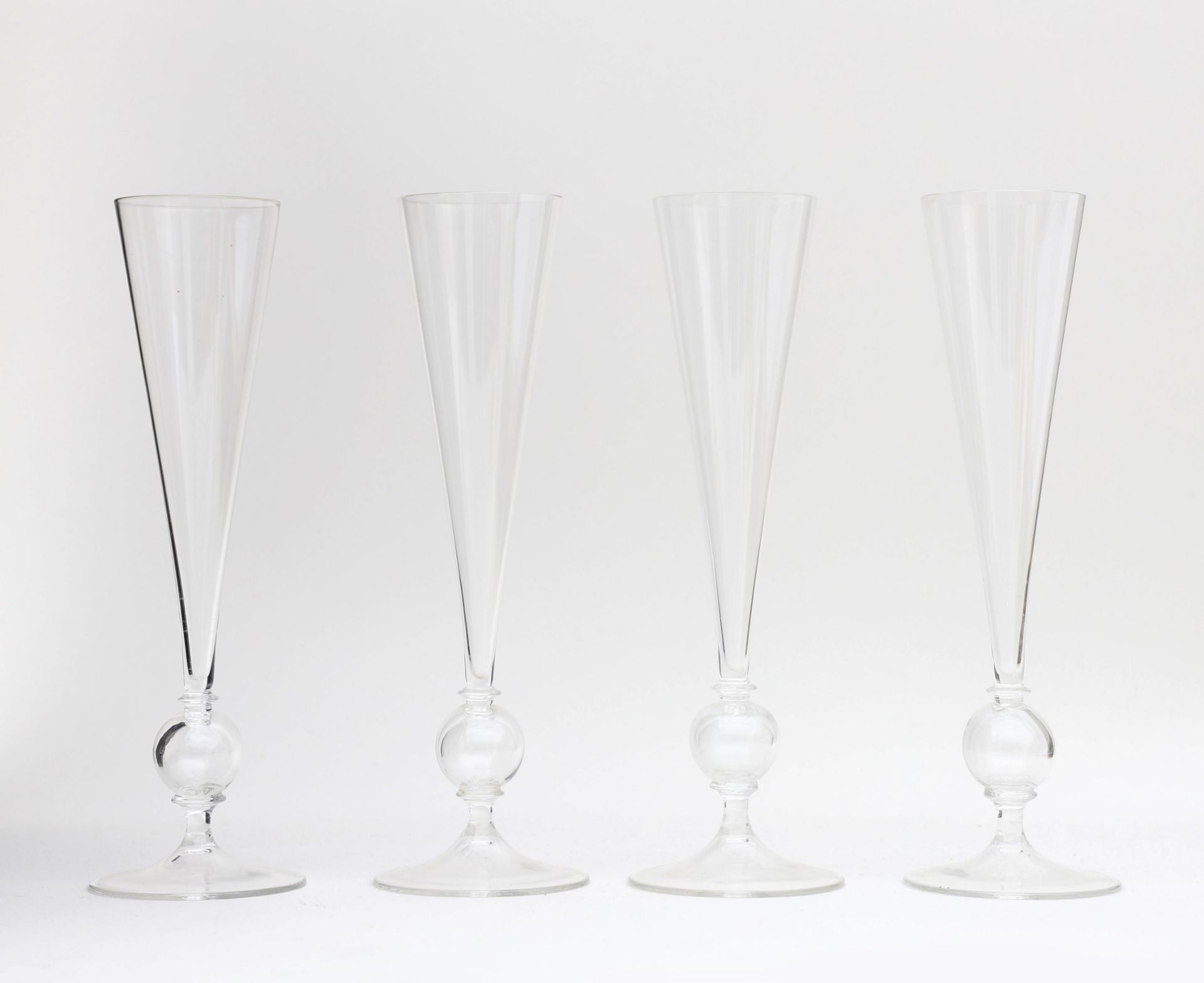 Gerard Muller (1879-1969) Four Champagne glasses of the service Regina, produced by Josephinenhütte,