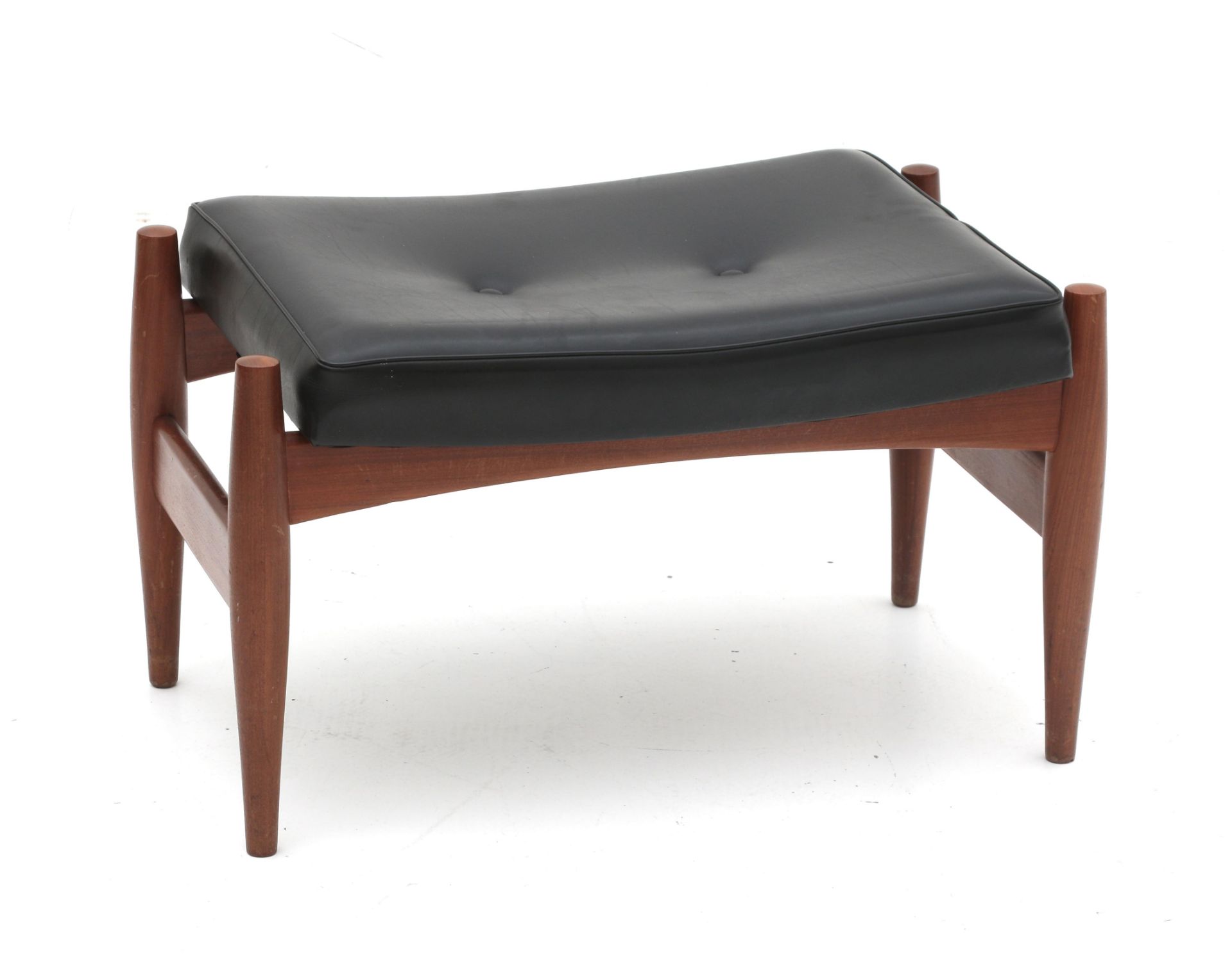 Midcentury Modern A teak ottoman with black leatherette upholstery, 1960s. 38 x 64 40 cm. (hxwxd)