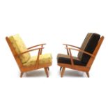 Midcentury Modern A pair of beech wood easy chairs with re-upholstered cushions. 82 cm. h. (2x)