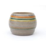 Potterie Kennemerland, Velsen A ceramic vase decorated with purple, orange, green and yellow