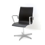 Arne Jacobsen (1902-1971) A revolving brown leather upholstered and metal Oxford office chair with