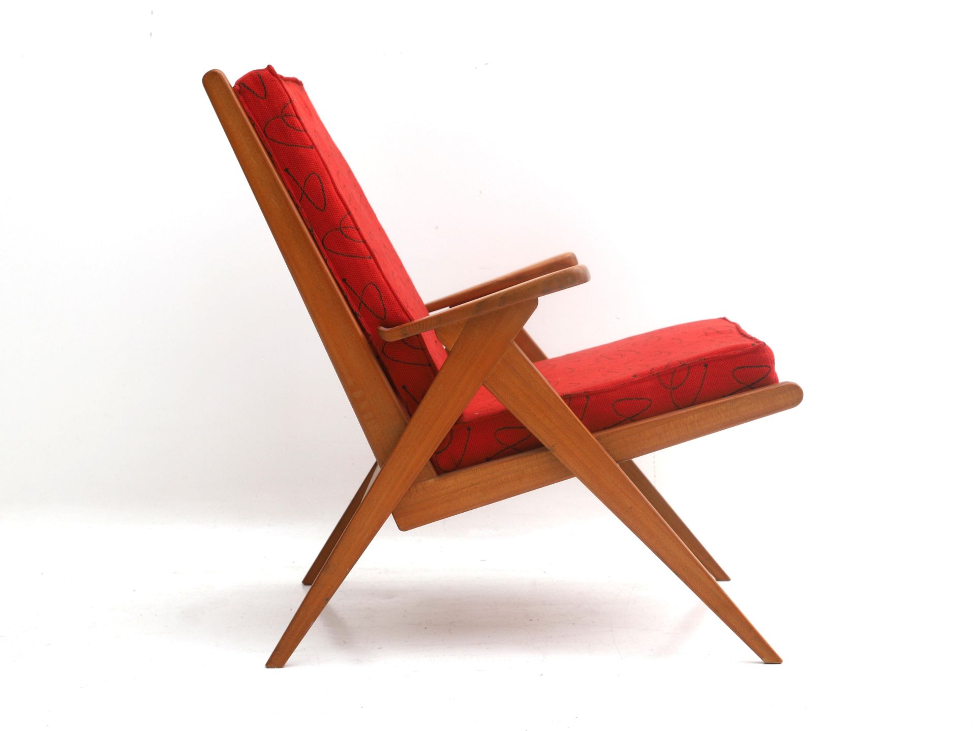 Midcentury Modern A teak easy chair, the seat an backrest upholstered in red fabric, circa 1960.