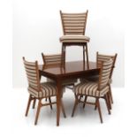 Midcentury Modern An adjustable dining table with five chairs with striped re-upholstered seats
