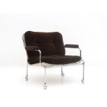 Seventies A chromium plated tubuar steel easy chair on casters, with canvas seat, brown ribbed