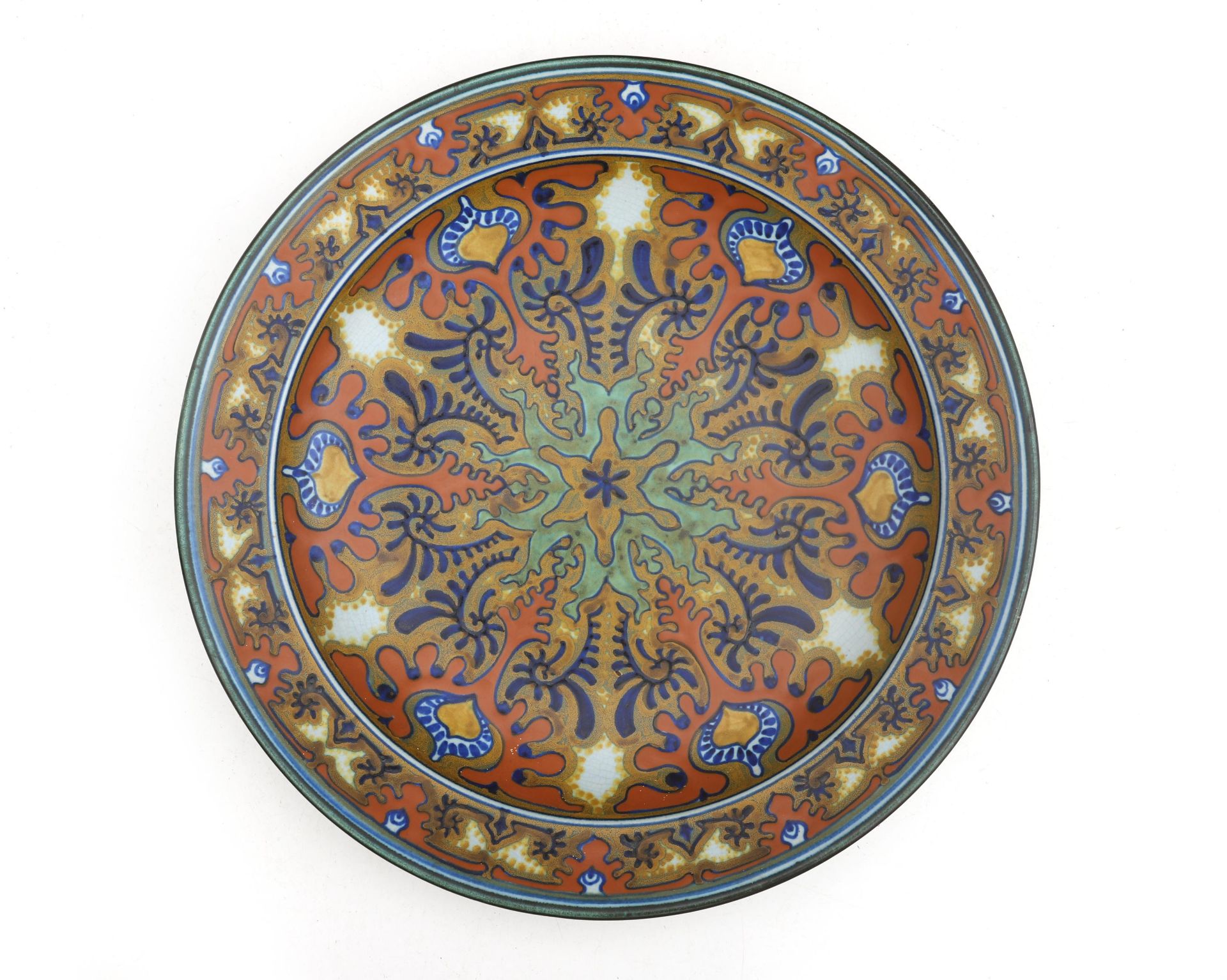 Plateelbakkerij Zuid Holland, Gouda A ceramic wall plate, pattern 'Rhodian', signed to the reverse