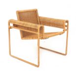 Marcel Breuer (1902-1981) (in the style of) A cane wickered armchair inspired by the Wassily