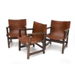 Paco Muñoz (1929-2009) Three Spanish lacquered wooden armchairs with brown saddle leather seats,