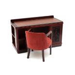 Adrianus Remiëns (1890-1972) A mahogany and coromandel Amsterdam School desk with red upholstered