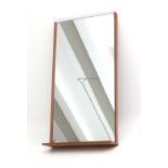 Midcentury Modern A rectangular wall mirror with teak frame and integrated shelf, 1950s. 92 x 47 x