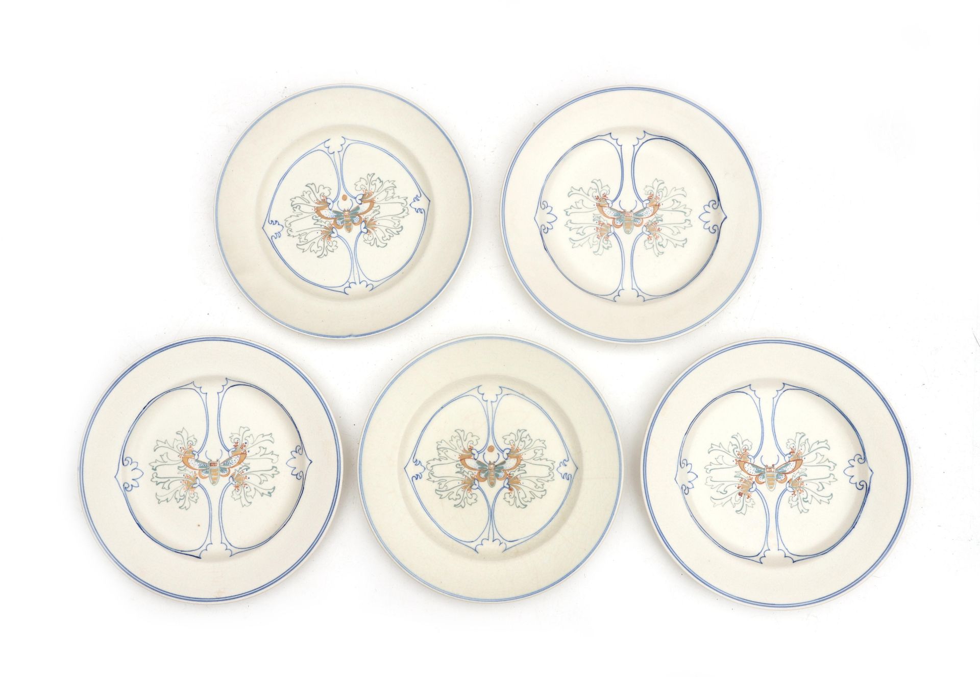 N.V. Arnhemsche Fayencefabriek Five matt white glazed ceramic dining plates with stylised linear