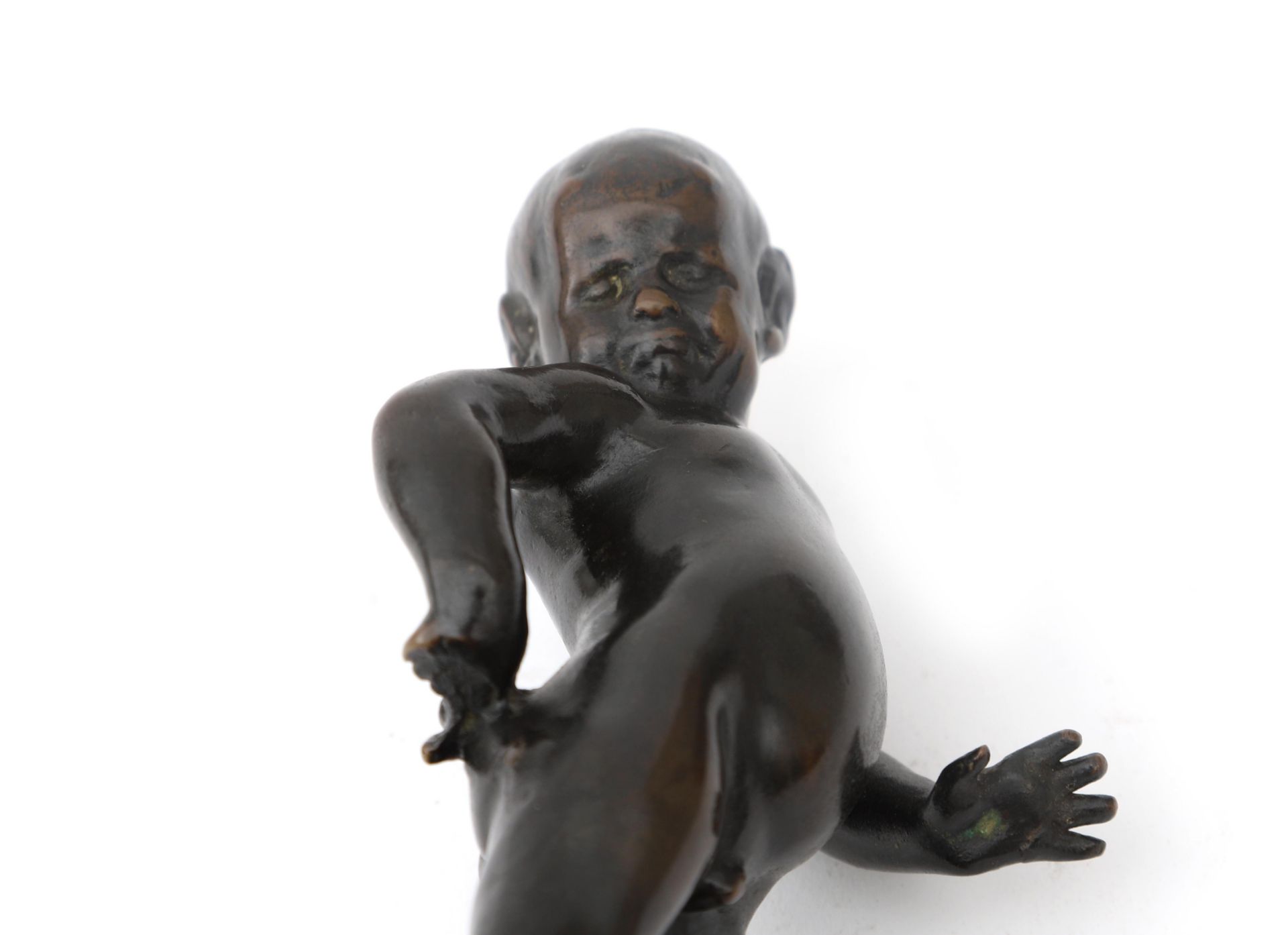 Art Deco A patinated bronze figure of a young Faun, on stone base, unsigned. 21 cm. h. (incl. base) - Image 3 of 6