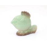 Potterie Kennemerland, Velsen A green glazed moulded ceramic figure of a fish, designed by Karl