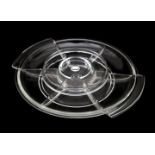 A.D. Copier (1901-1991) A clear moulded glass hors d'oeuvre dish on moulded glass rotating disc,